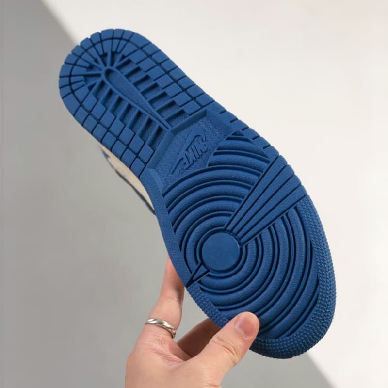 Blue and white mid-top sneakers