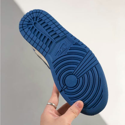 Blue and white mid-top sneakers